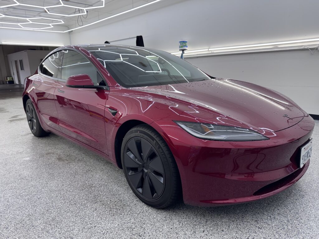 Red Tesla Model 3 with ceramic window tint at Tru-Tints Concord